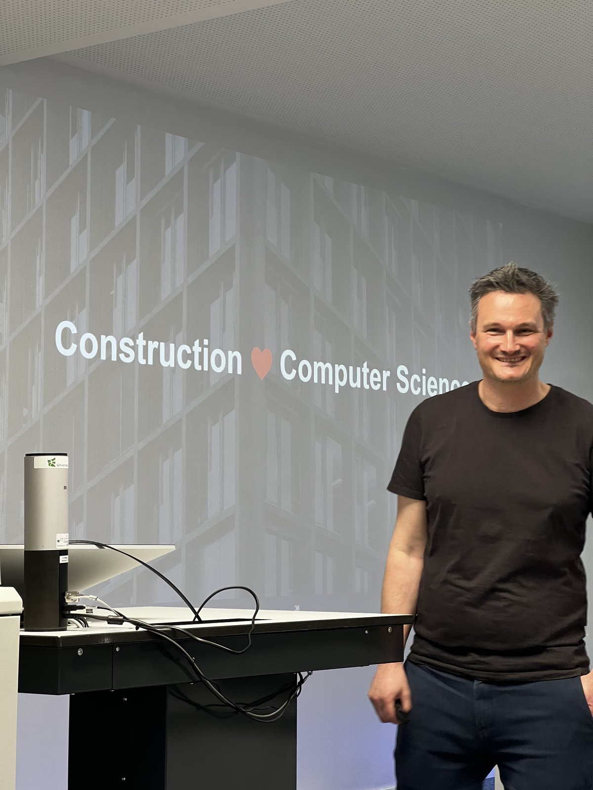 Manuel Eugster in front of his closing slide, Construction loves Computer Science
