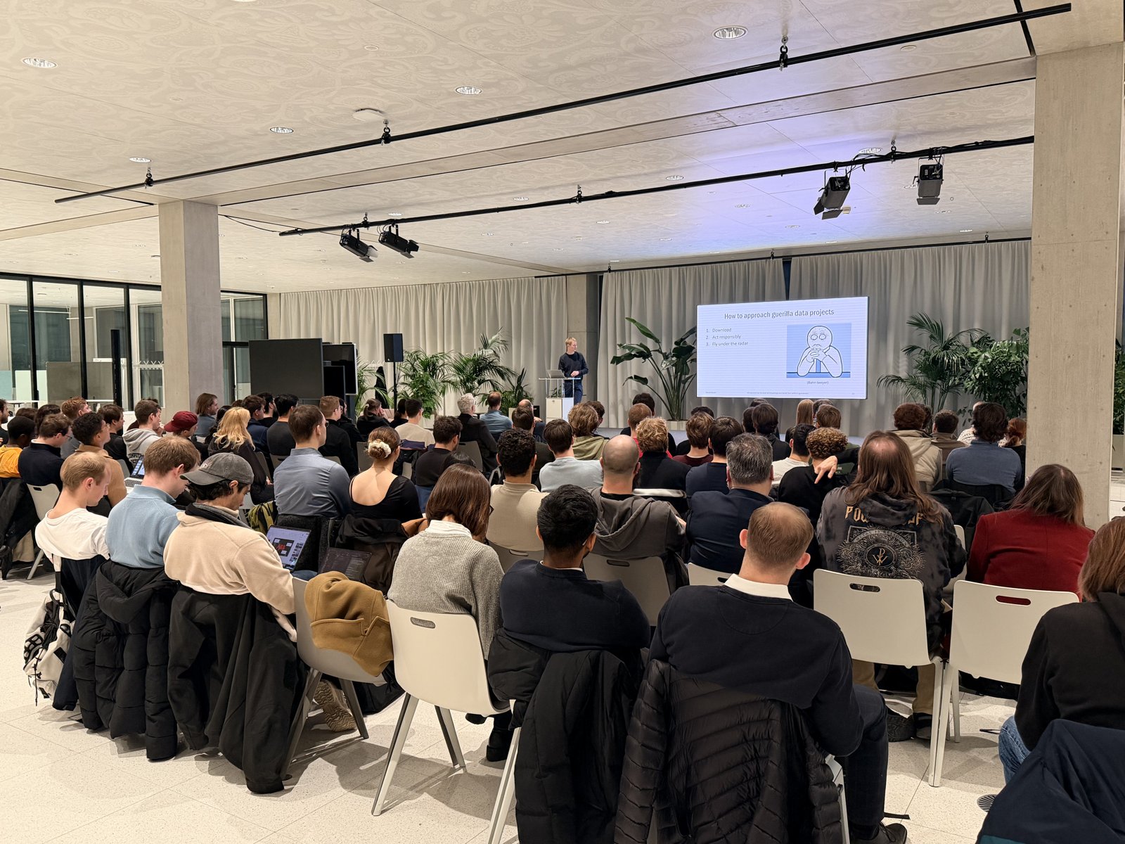 A full house at SQUARE for the colloquium talk of the SCS Student Conference