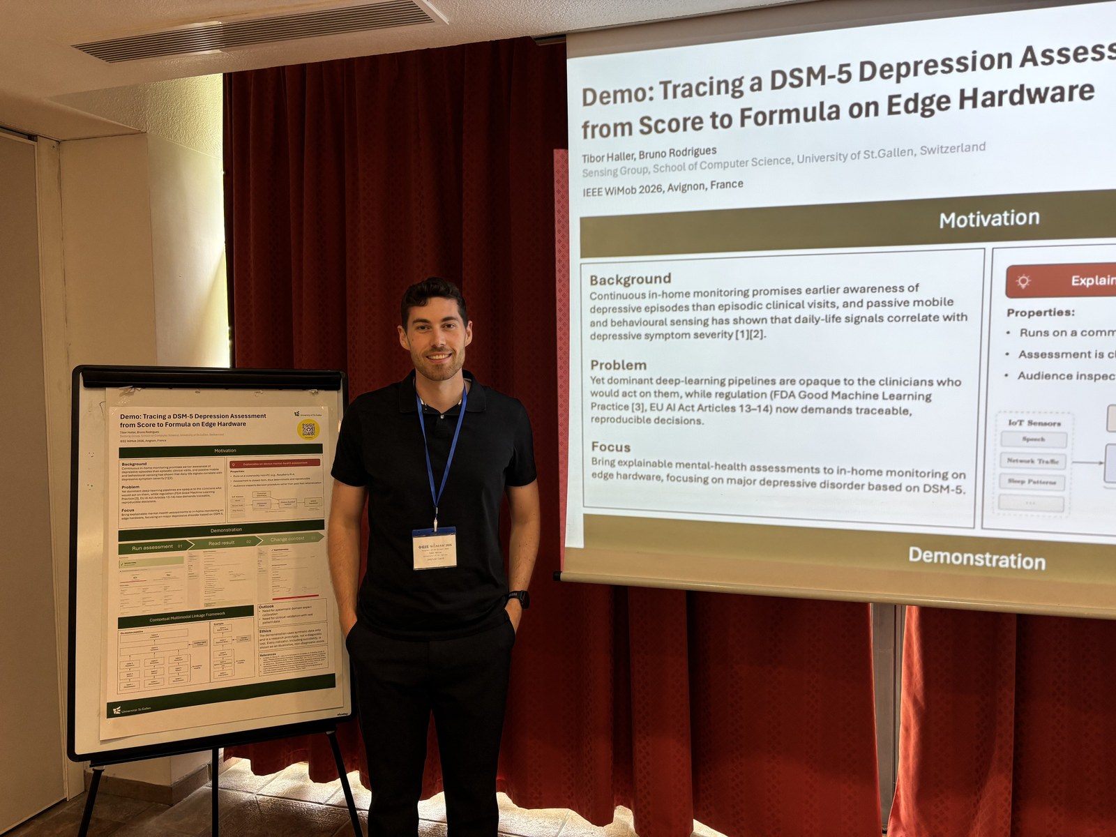Tibor Haller with the demo poster at IEEE WiMob 2026 in Avignon.