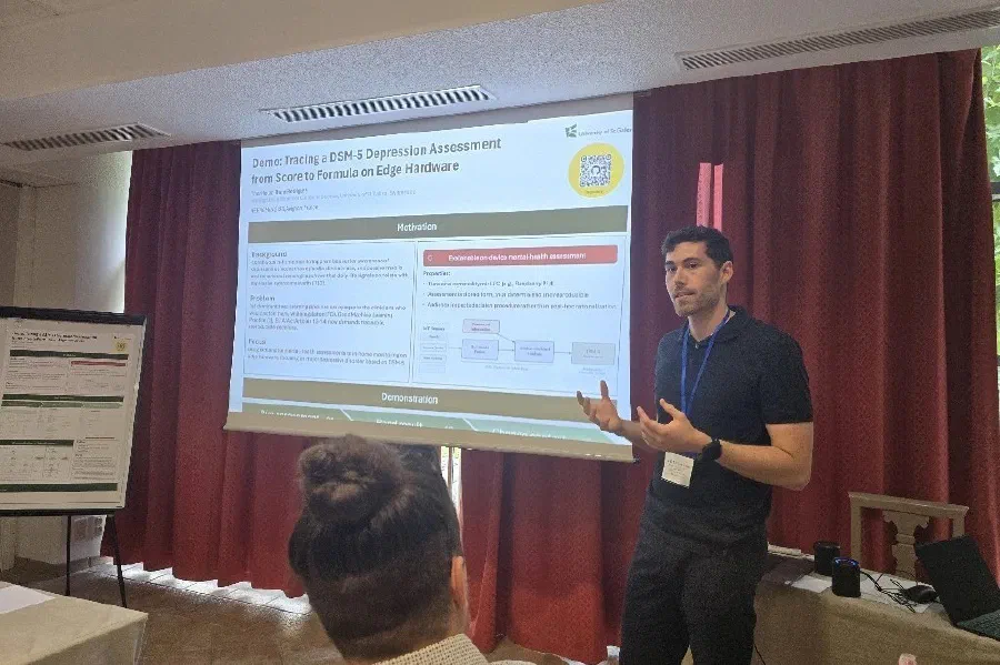 Tibor Haller presenting the demo at IEEE WiMob 2026.